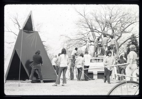 Woodstock West, students erect a tent