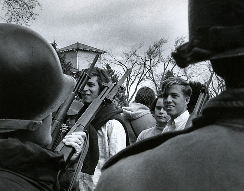 Woodstock West, students, guards, guns